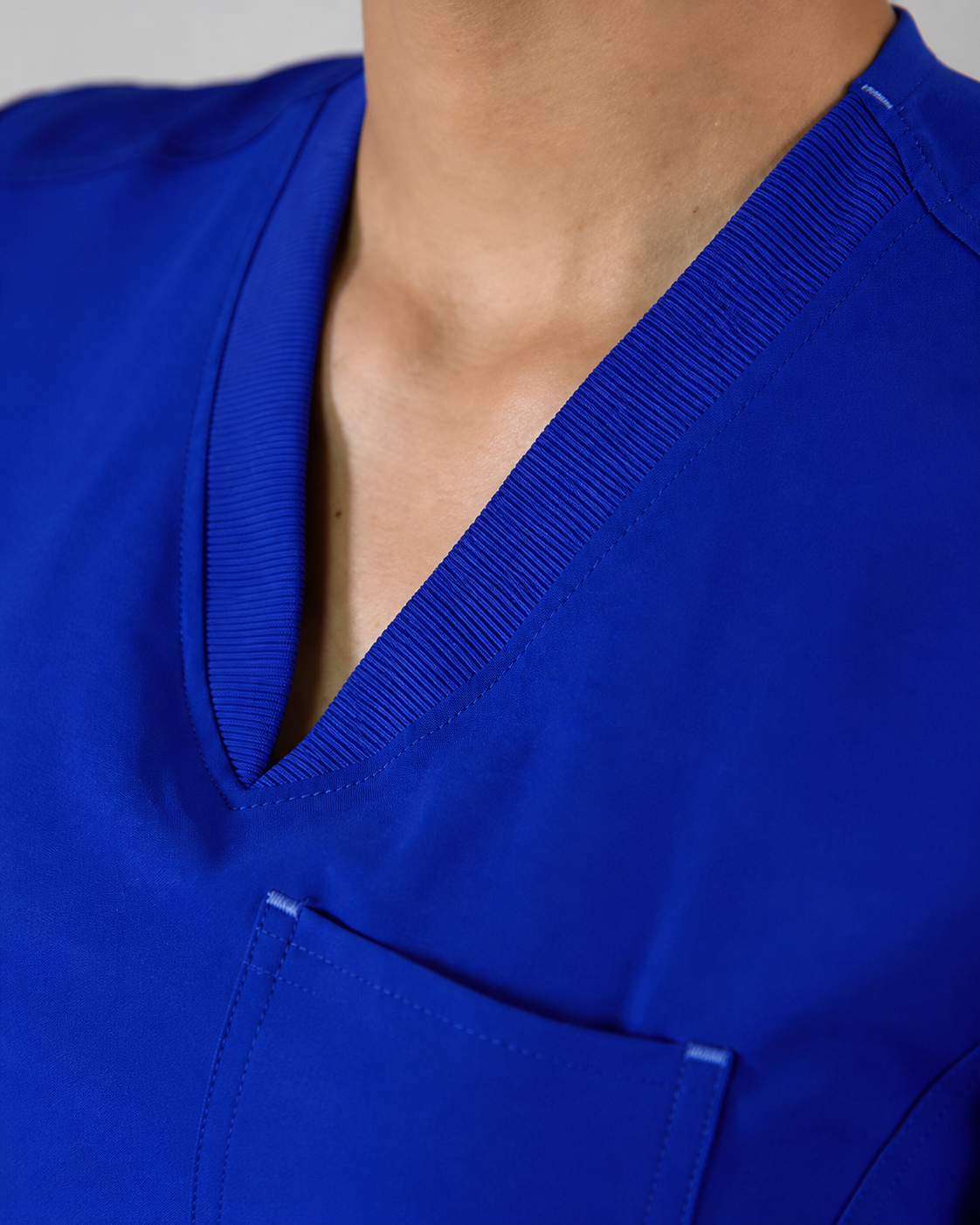 Delantal Antifluido Violeta Azul Rey